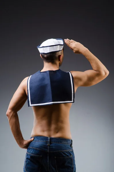 Ripped sailor against dark background — Stock Photo, Image