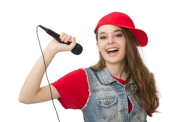 Mooi meisje zingt karaoke geïsoleerd op wit — Stockfoto