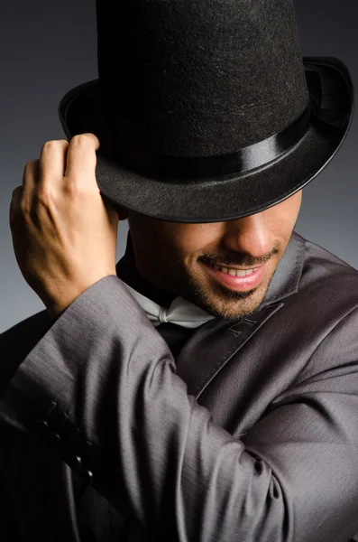 Man with hat in vintage concept — Stock Photo, Image