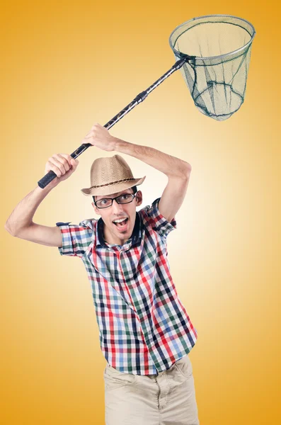 Gardener with net against the gradient — Stock Photo, Image