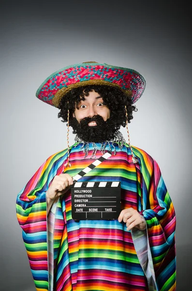 Funny hairy mexican with movie clapper — Stock Photo, Image