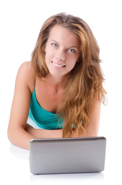 Pretty girl using laptop isolated on white — Stock Photo, Image