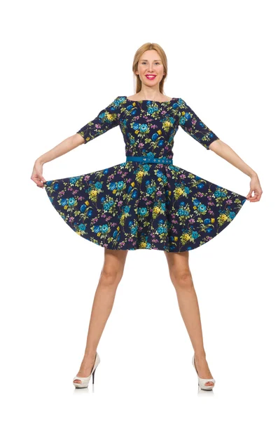 Frau in dunkelblauem Blumenkleid — Stockfoto