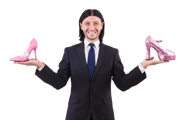 Чоловік з жіночим взуттям ізольовано на білому — стокове фото