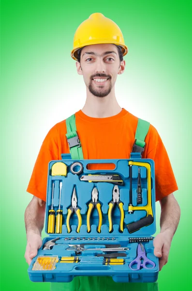 Repairman in coveralls in industrial concept — Stock Photo, Image