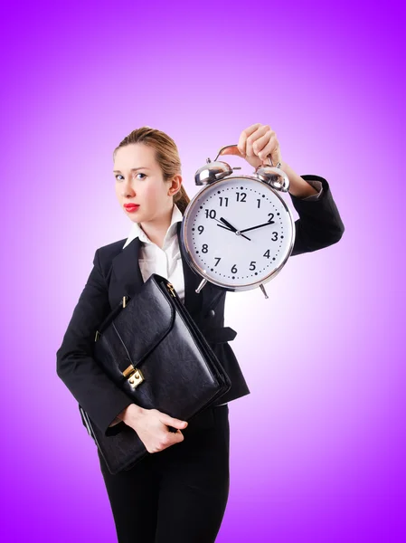 Woman businesswoman with giant clock — Stock Photo, Image