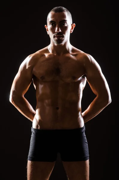 Muscular man posing — Stock Photo, Image