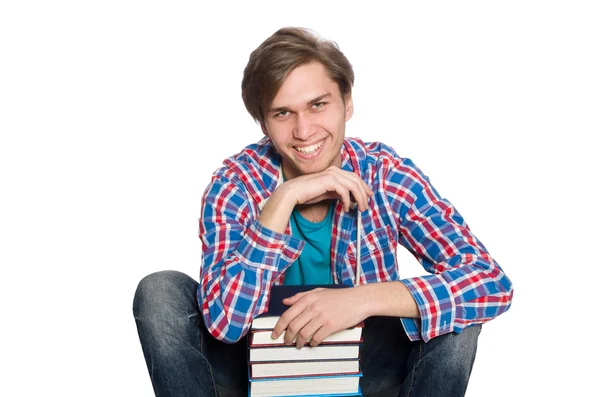 Смешной студент с книгами, изолированными на белом — стоковое фото