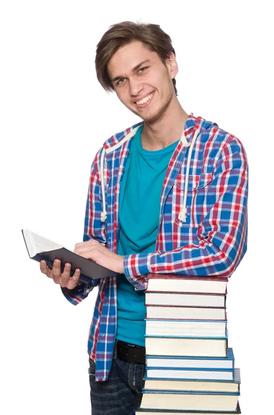 Смешной студент с книгами, изолированными на белом — стоковое фото