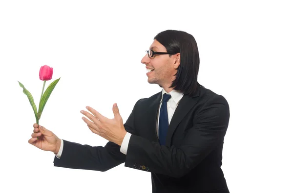 Knappe zakenman met bloem geïsoleerd op wit — Stockfoto