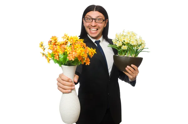 Stilig affärsman med blomkruka isolerad på vit — Stockfoto