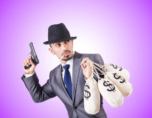 Businessman criminal with sacks of money — Stock Photo, Image