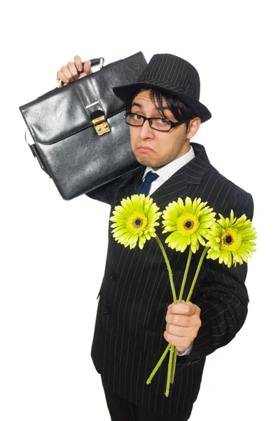 Hombre joven en traje negro con flor aislada en blanco —  Fotos de Stock