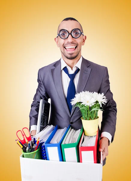 Man being fired with box of personal stuff — Stock Photo, Image