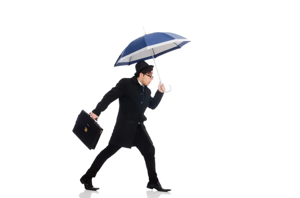 Młody mężczyzna trzymający walizkę i parasol na białym tle — Zdjęcie stockowe