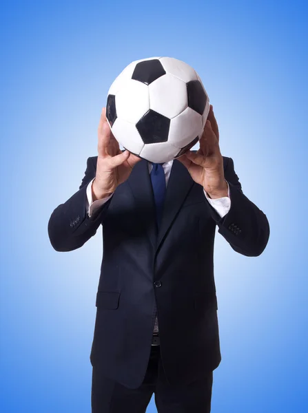 Businessman with football against the gradient — Stock Photo, Image