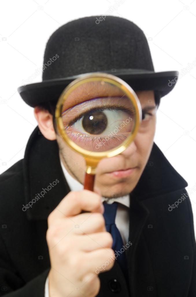 Sherlock Holmes with magnifying glass isolated on white
