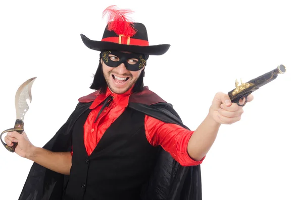 Joven con abrigo de carnaval con pistola aislada en blanco —  Fotos de Stock