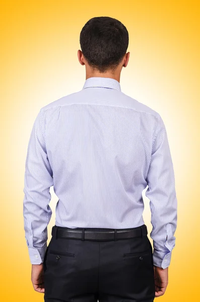 Male model with shirt against the gradient — Stock Photo, Image