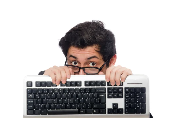 Молодой сотрудник с клавиатурой изолирован на белом Стоковое Фото