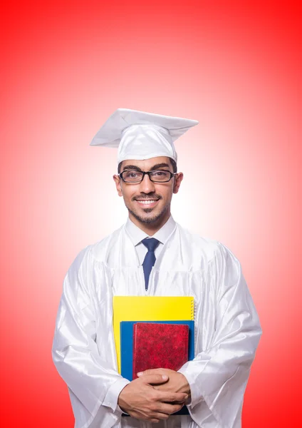 Jonge mannelijke student tegen het verloop — Stockfoto