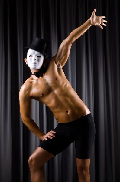 Muscular actor with theatrical mask — Stock Photo, Image