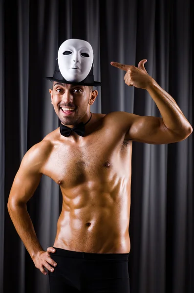 Muscular actor with theatrical mask — Stock Photo, Image