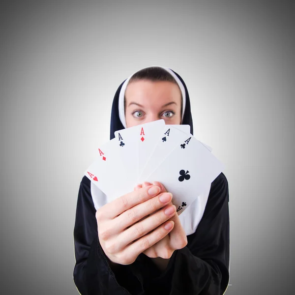 Nun in the gambling concept — Stock Photo, Image