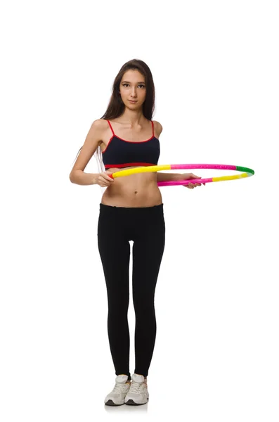 Dziewczyna w sportowym garniturze z hula hoop odizolowana na białym — Zdjęcie stockowe