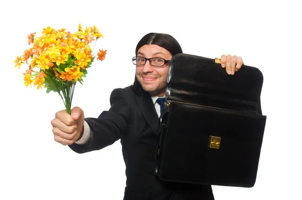 Knappe zakenman met bloem en korte geval geïsoleerd op wit — Stockfoto