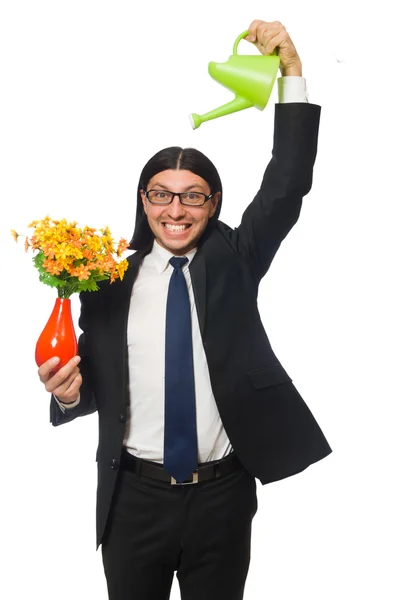 Bello uomo d'affari con vaso di fiori isolato su bianco — Foto Stock