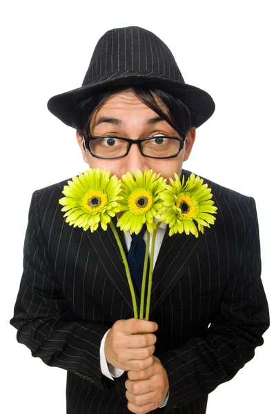 Hombre joven en traje negro con flor aislada en blanco — Foto de Stock