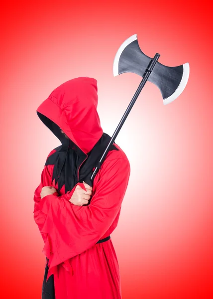 Executioner in red costume with axe on white — Stock Photo, Image