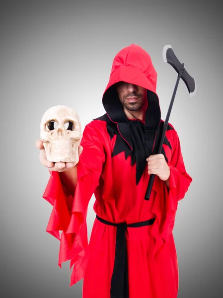 Executioner in red costume with axe — Stock Photo, Image
