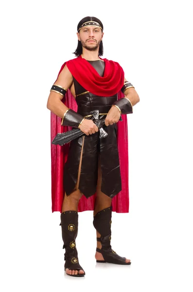 Gladiátor pózuje s mečem izolovaných na bílém — Stock fotografie