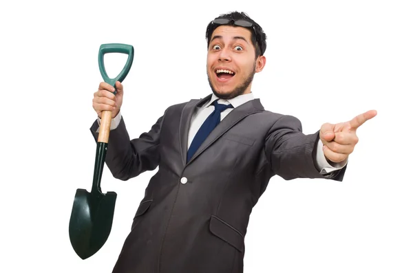 Young businessman holding a spade — Stock Photo, Image