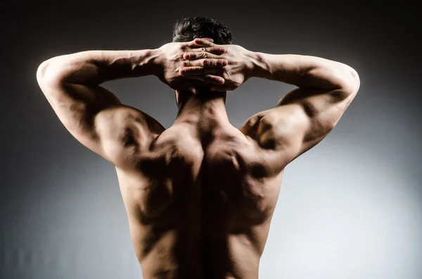 Muscular man posing — Stock Photo, Image