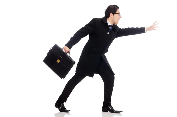 Young man holding suitcase isolated on white — Stock Photo, Image