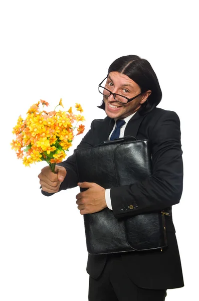 Handsome businessman with flowers — Stock Photo, Image