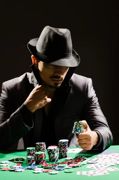 Man playing in casino — Stock Photo, Image