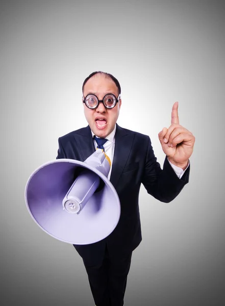 Funny man with loudspeaker against the gradient — Stock Photo, Image
