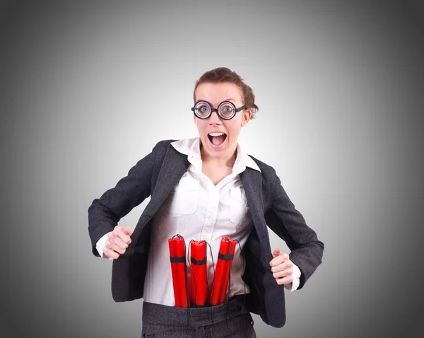 Businesswoman with dynamite against the gradient — Stock Photo, Image