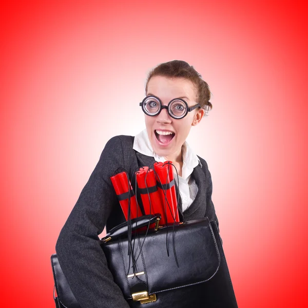 Businesswoman with dynamite against the gradient — Stock Photo, Image