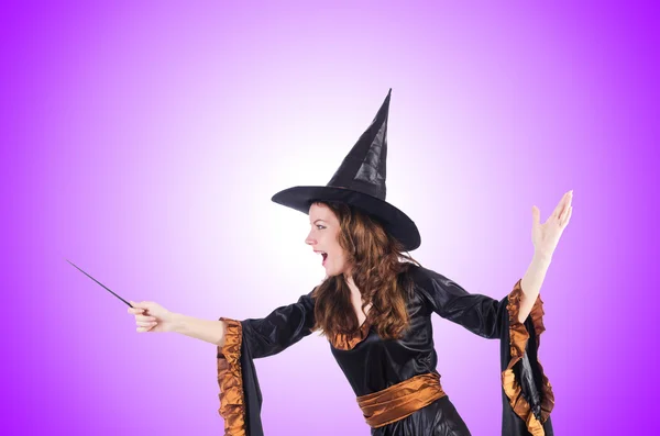 Witch with wand isolated on the white — Stock Photo, Image