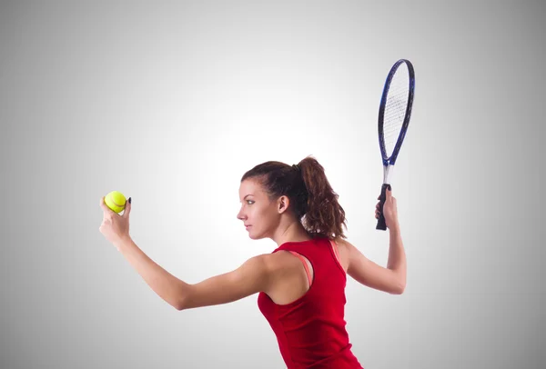 Femme jouant au tennis — Photo