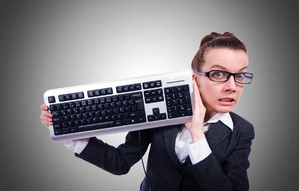 Nerd businesswoman with computer keyboard — Stock Photo, Image