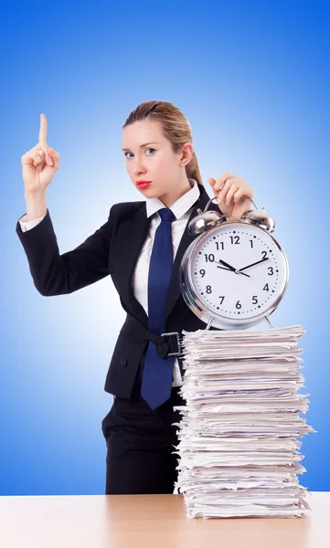 Woman businesswoman with clock and papers — Stock Photo, Image