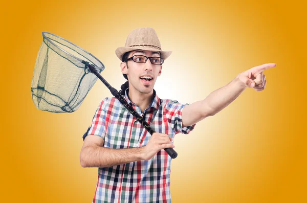 Gardener with net against the gradient — Stock Photo, Image