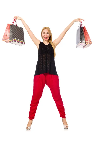 Ung kvinna efter shopping isolerad på den vita — Stockfoto