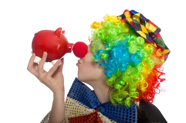 Clown femminile con moneybox isolato su bianco — Foto Stock